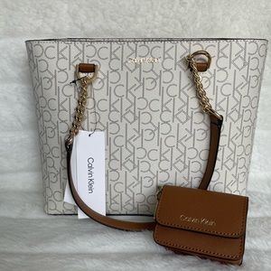 Brand New Beautiful CK LOGO Calvin Klein
Camel/ Gold/ AlmondHandbag tote